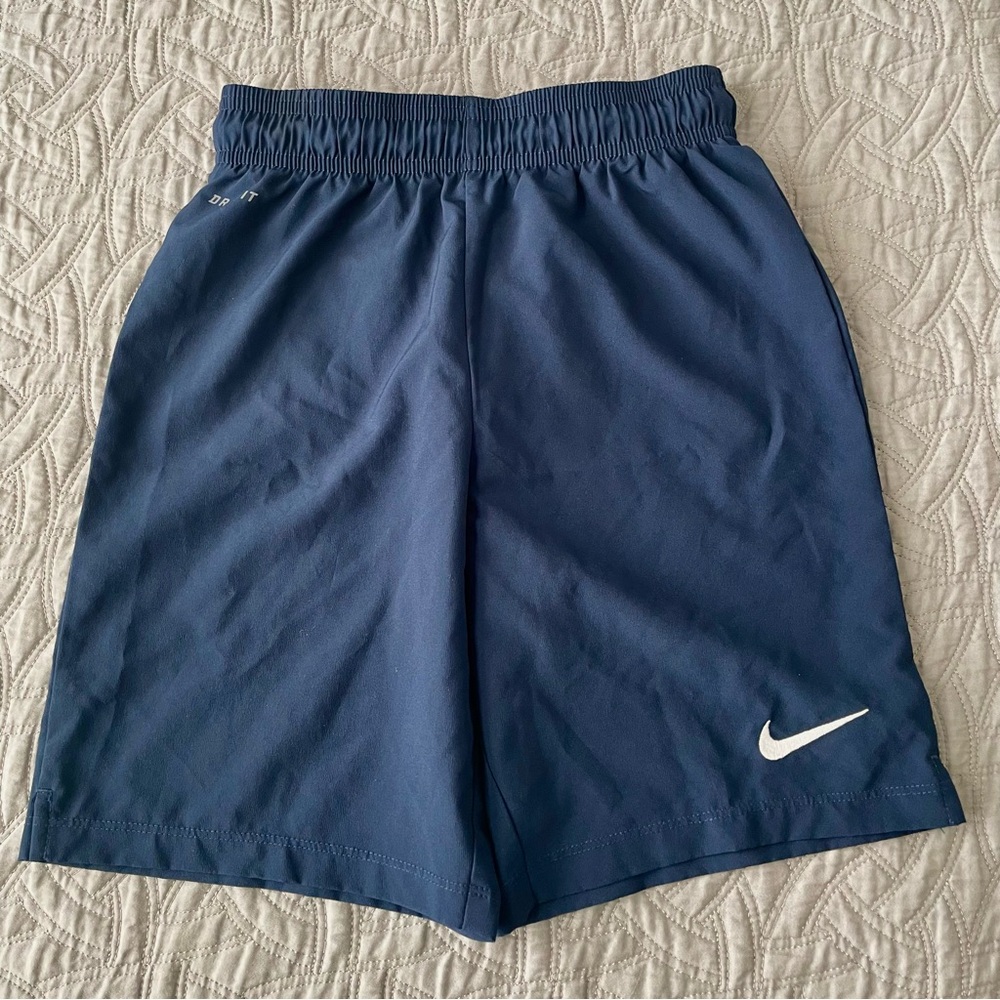 Nike Kid’s DriFit Laser Woven III Soccer Shorts
 7” Inseam Size M